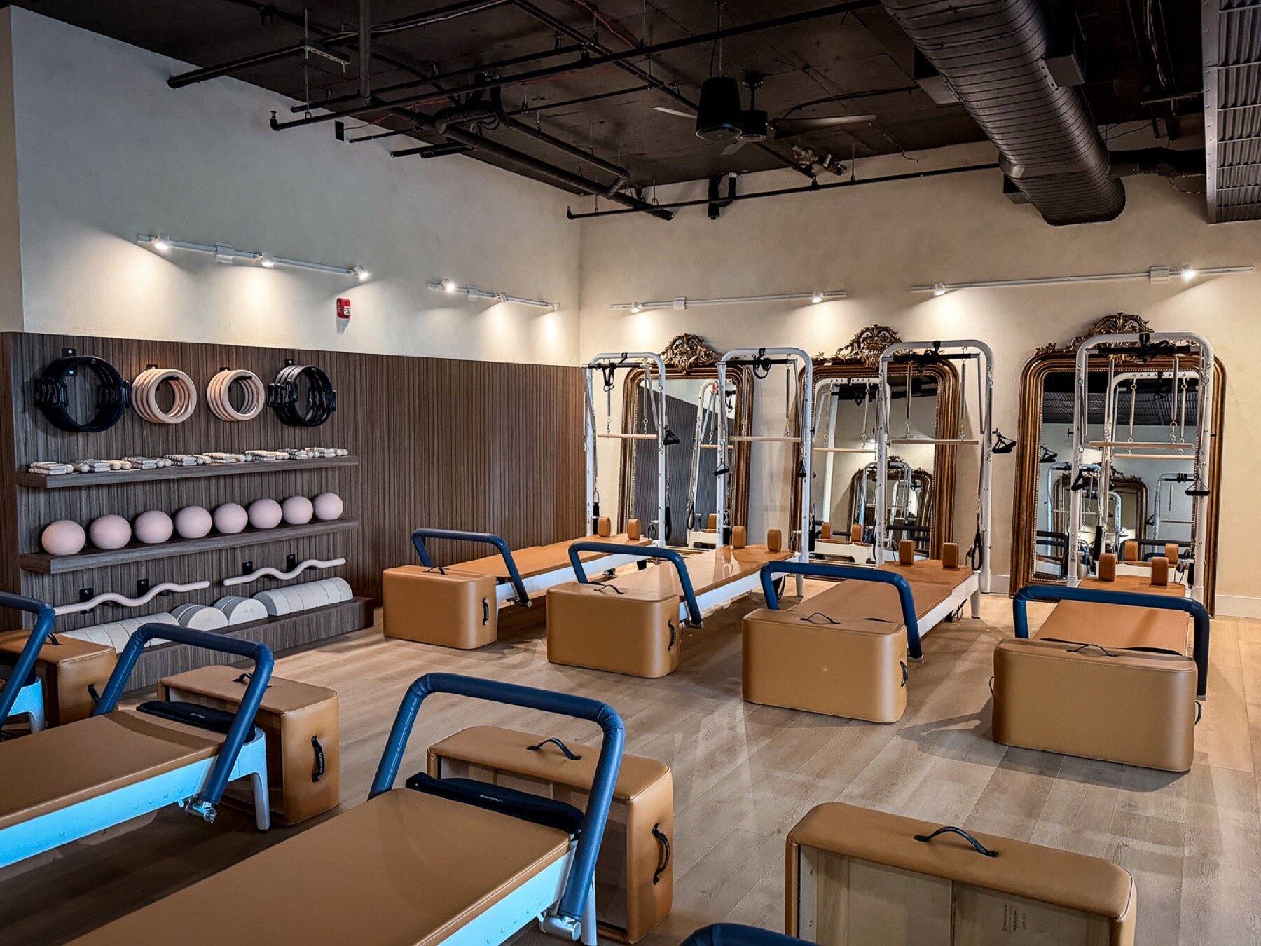 The Aria Pilates studio in Kirkland: eight reformers in warm natural light